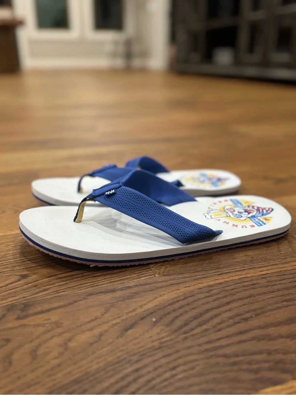 IZOD SUNNY TIMES Blue Strap White Footbed Flip Flops with Graphic